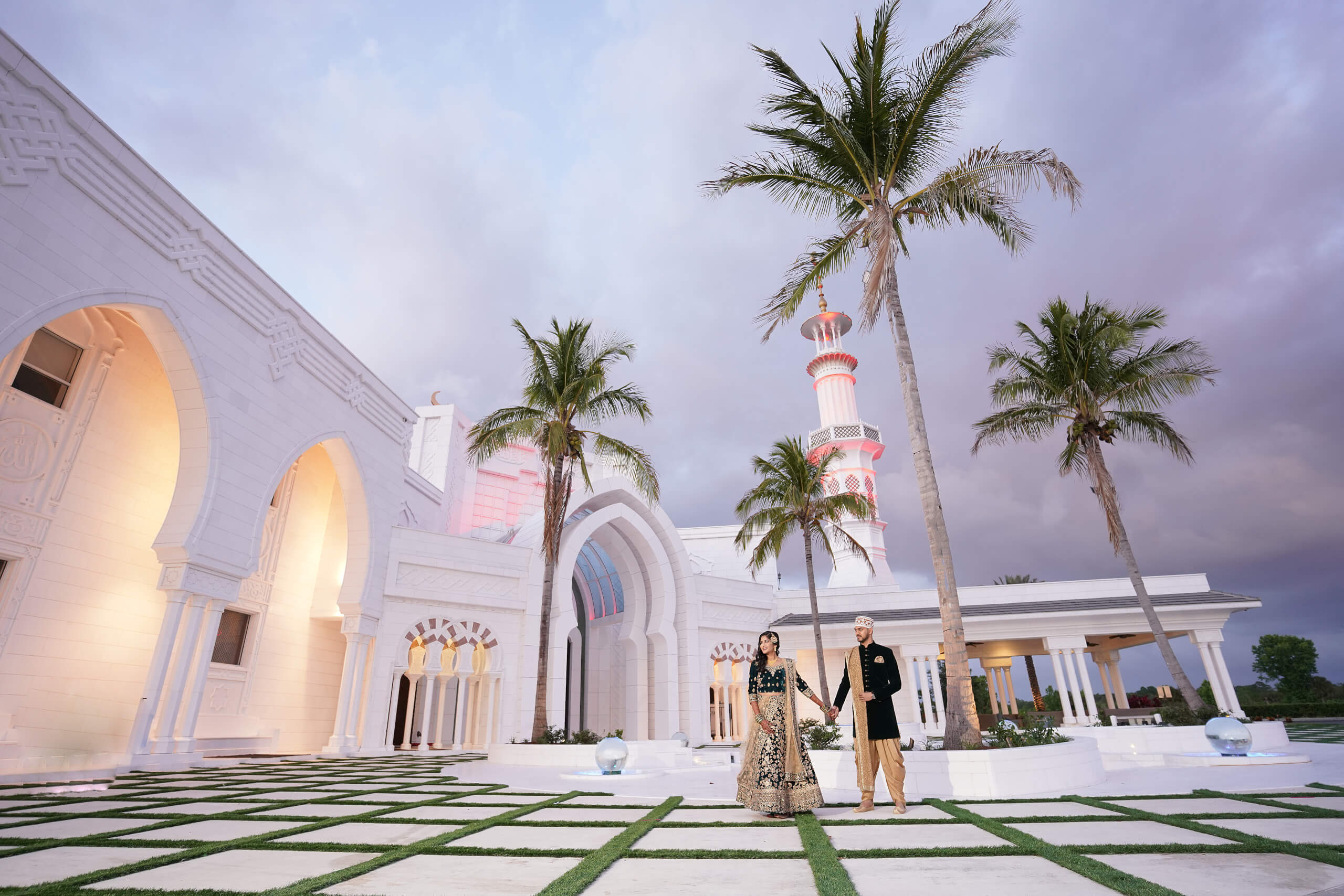 beautiful couple taking wedding photographs outside of our masjid wedding venue in Florida